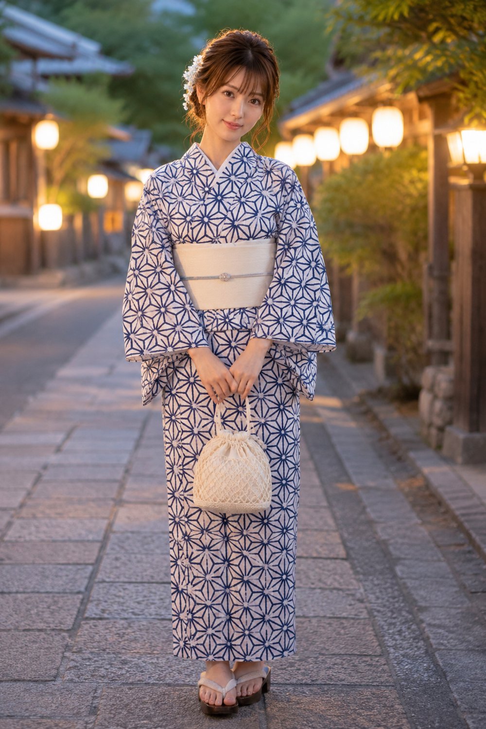 A young woman in a summer yukata featuring the asanoha hemp leaf pattern