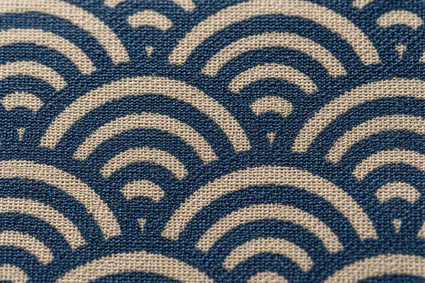 Close-up of the seigaiha wave pattern on indigo and cream fabric