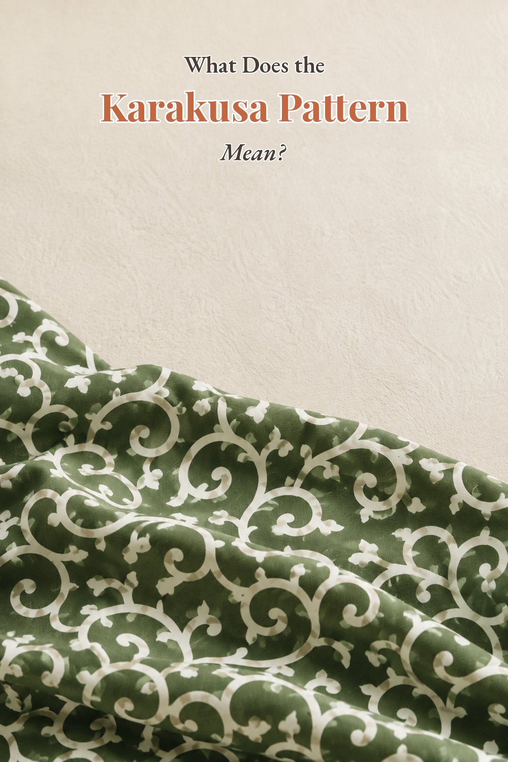 Close-up of a green karakusa scrolling-vine textile with the words What Does the Karakusa Pattern Mean
